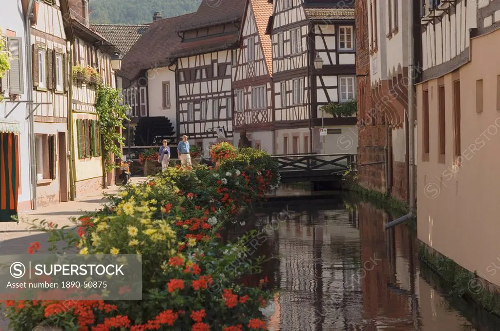 Traditional houses alongside millrace, Annweiler, Pfalzer Wald wine area, Rhineland Palatinate, Germany, Europe