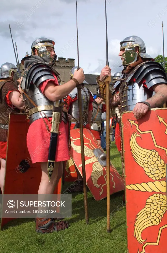 Two members of the Ermine Street Guard in conversation, Birdoswald Roman Fort, Hadrians Wall, Northumbria, England, United Kingdom, Euruope
