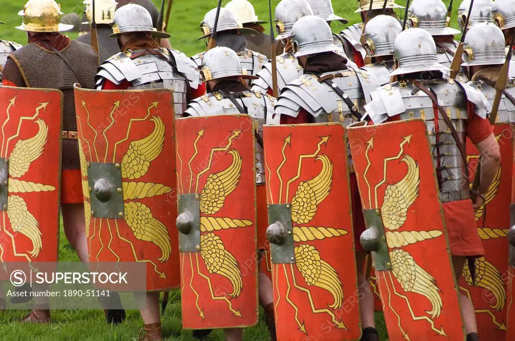 Roman soldiers of the Ermine Street Guard on the march, armour and shield detail, Birdoswald Roman Fort, Hadrians Wall, Northumbria, England, United K...
