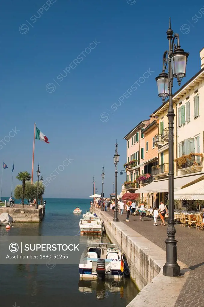 Harbour entrance and quayside cafes, Lazise, Lake Garda, Veneto, Italy, Europe