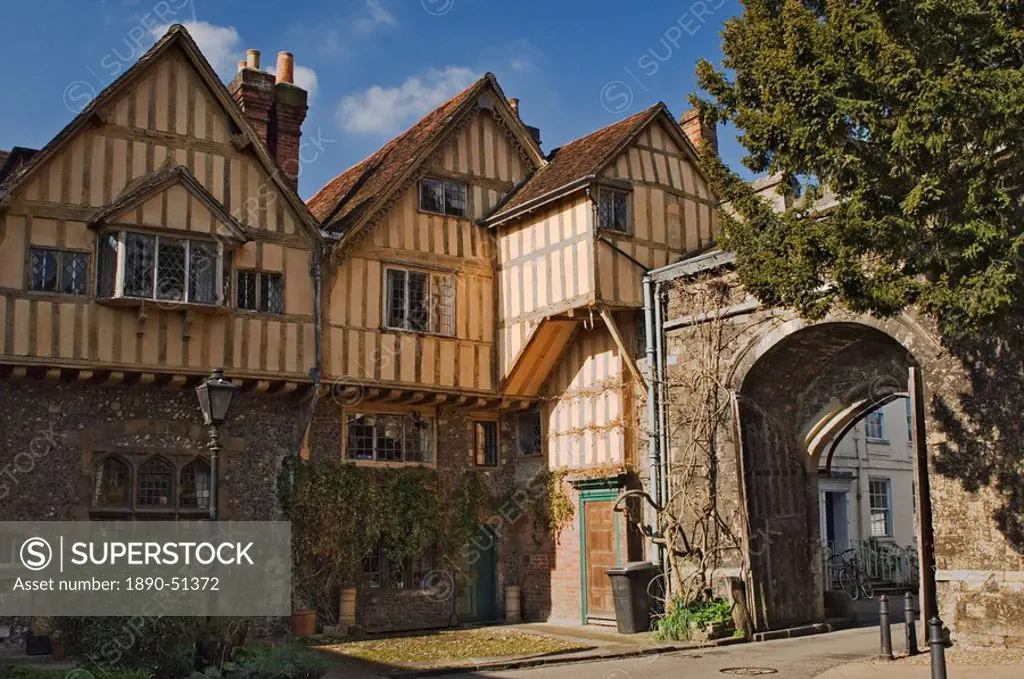 A city gate with timbered infilled gabled building, Winchester, Hampshire, England, United Kingdom, Europe