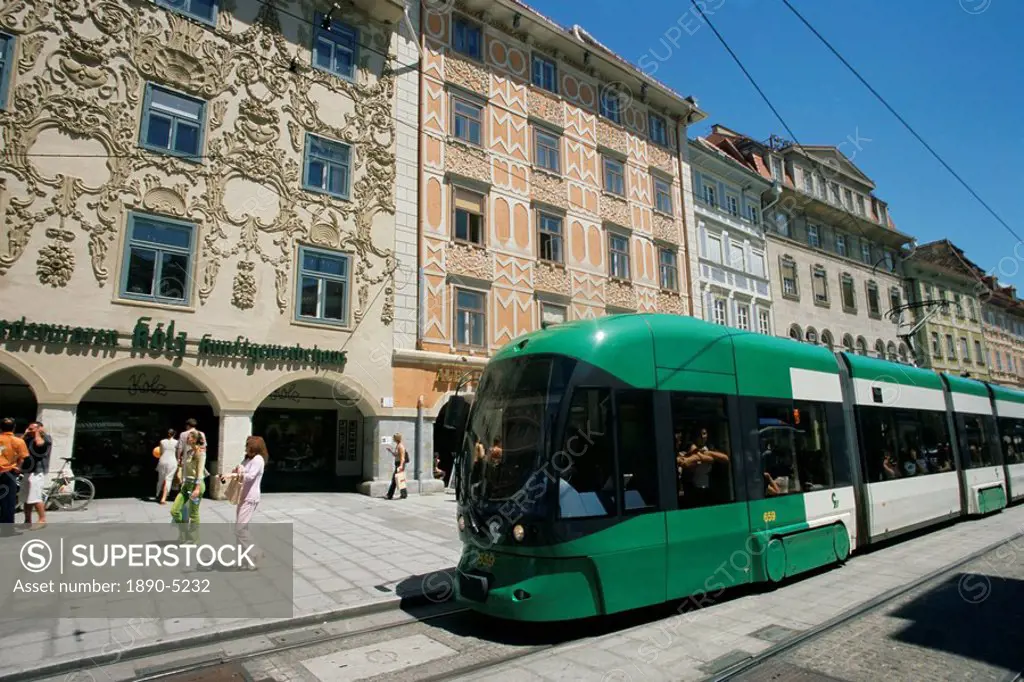 Trams run along Herrengasse, stop at Hauptplatz in main street of old town, Graz, Styria, Austria, Europe