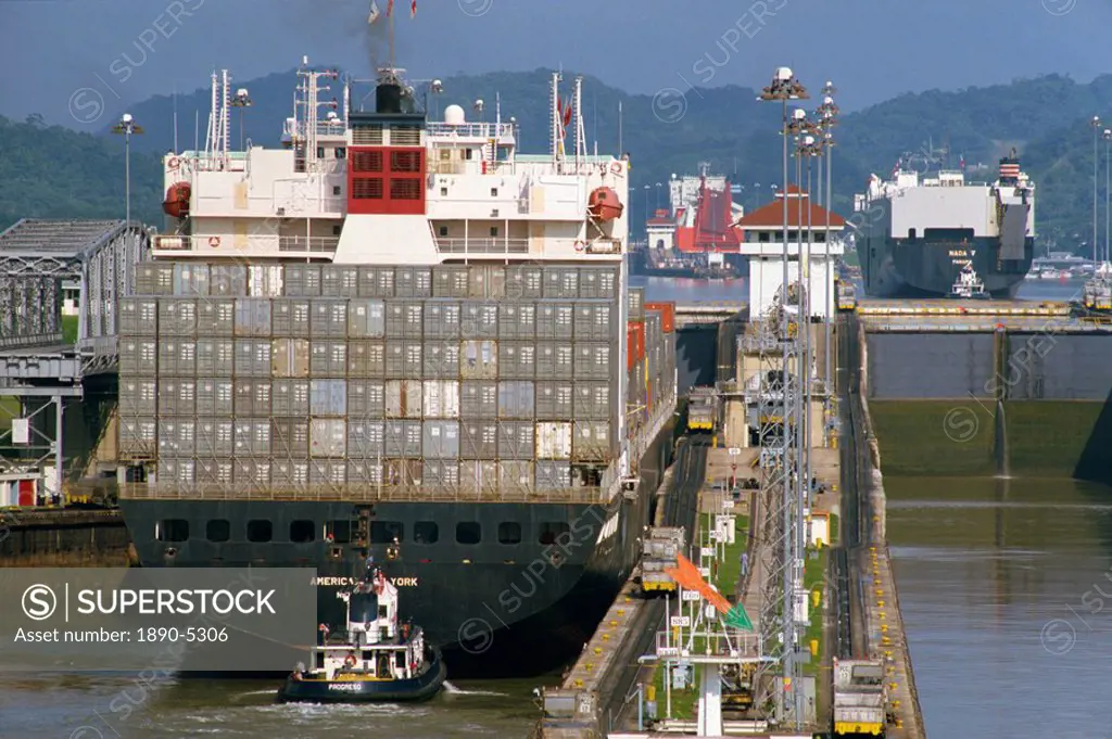 Container ship passing through the Miraflores Locks in the Panama Canal, Panama, Central America