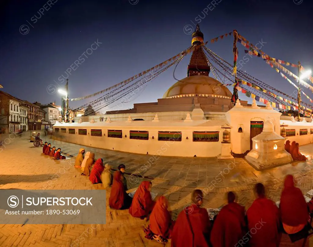 Panoramic image of Boudha, a large Tibetan stupa at Bodhnath, shortly before sunrise on the first day of Lhosar Tibetan New Year, UNESCO World Heritag...