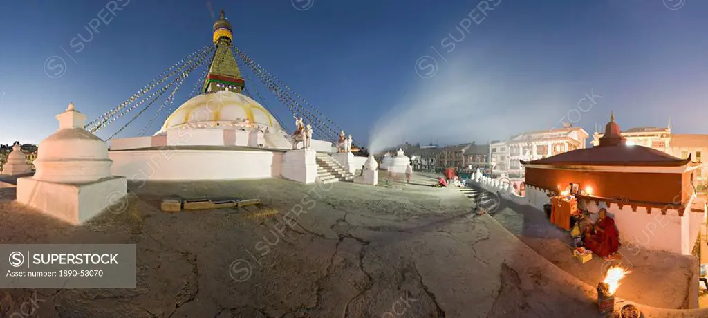 Panoramic image of Boudha, a large Tibetan stupa at Bodhnath, shortly before sunrise on the first day of Lhosar Tibetan New Year, UNESCO World Heritag...