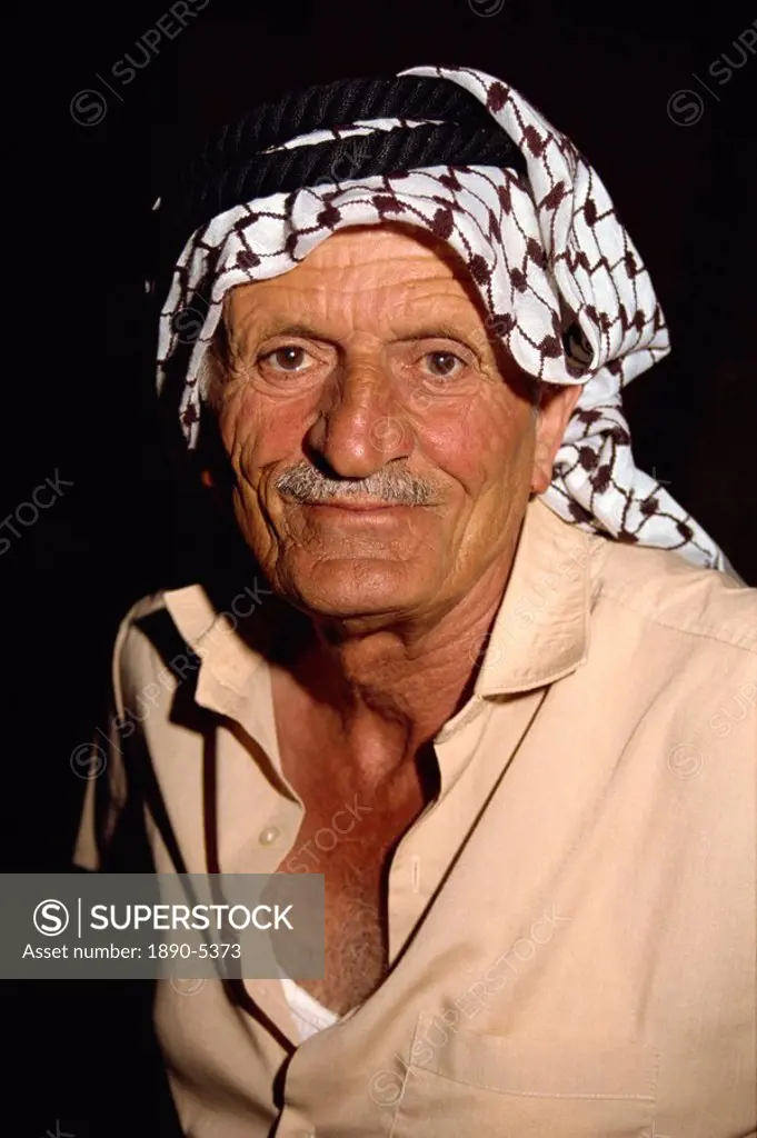 Portrait of an elderly man wearing a traditional headcloth, a guardian at the Folklore Museum, Amman, Jordan, Middle East