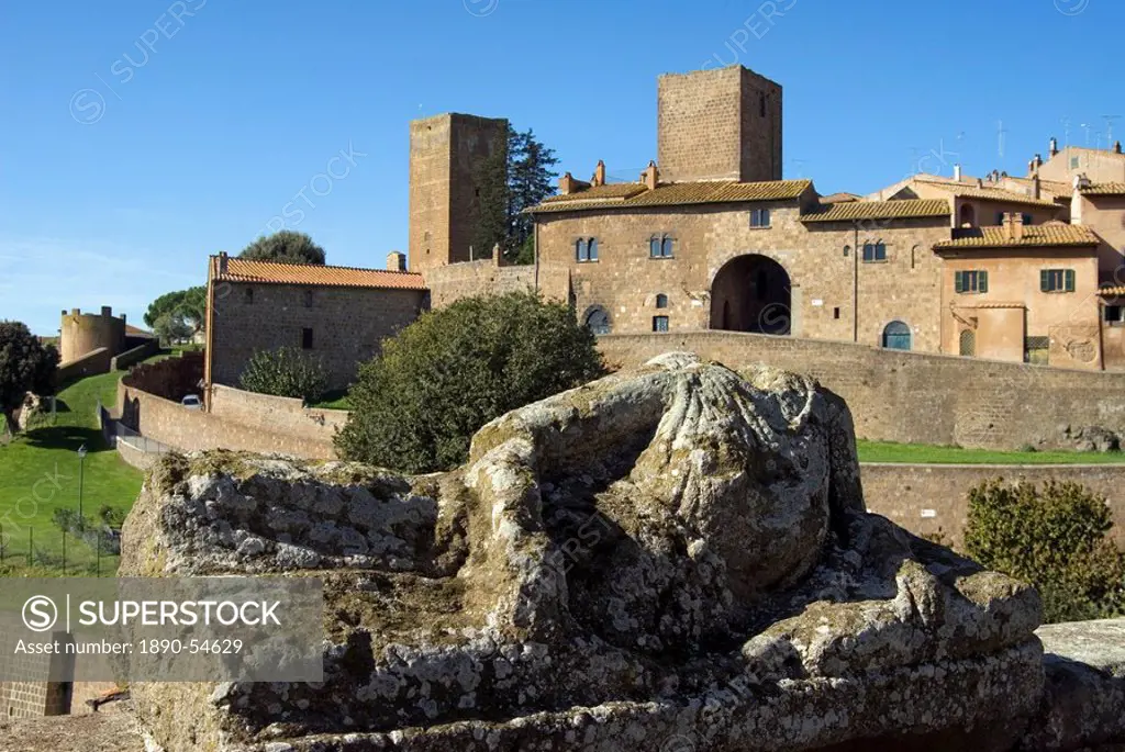View of Tuscania from Bastianini Square and Etruscan sarcophagus, Latium, Italy, Europe