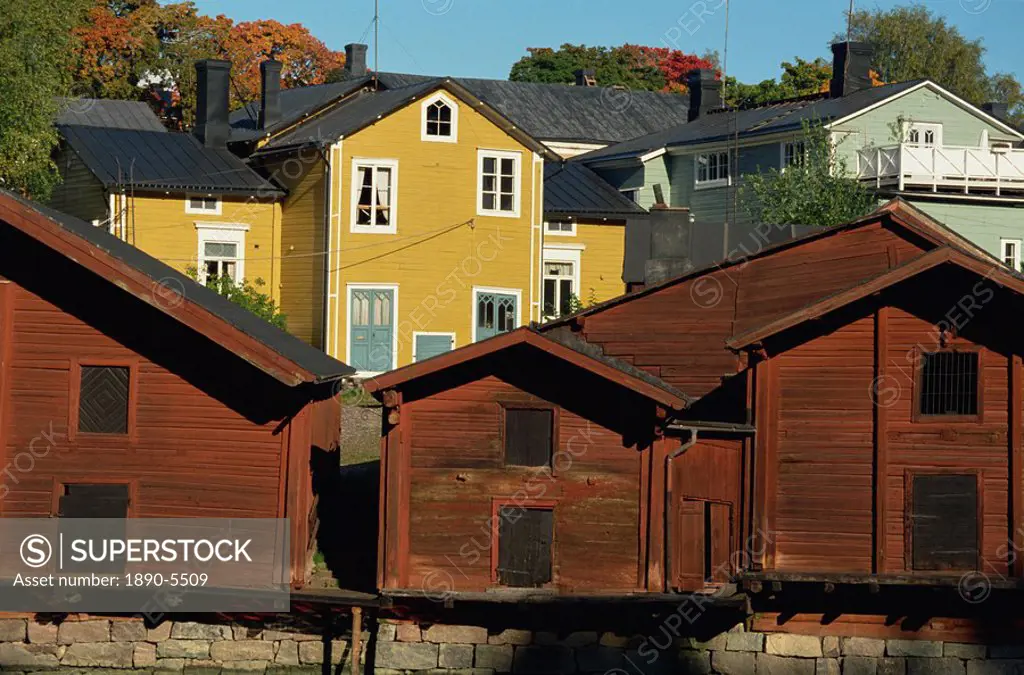 Typical heavy red of fishermen´s cottages and sheds lining the River Porvoo, Porvoo Borga, Finland, Scandinavia, Europe