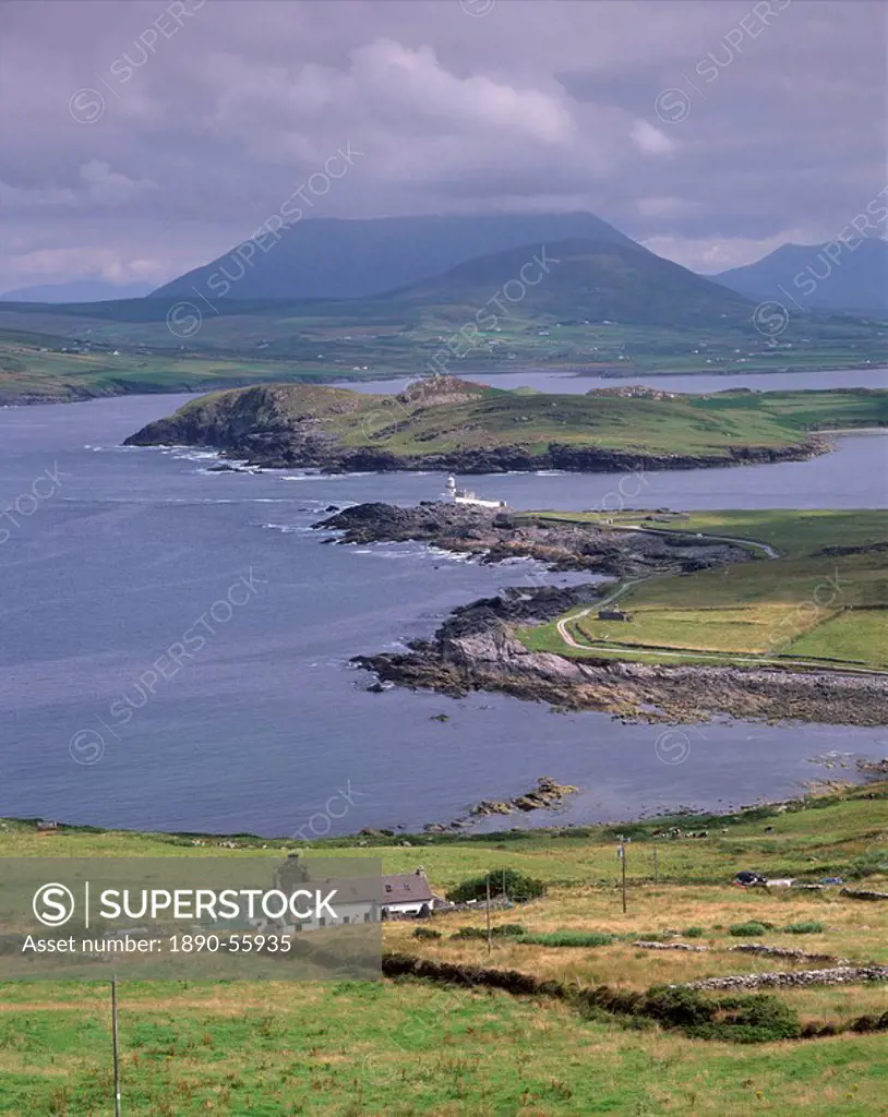 Lighthouse, Beginish Island, Doulus Bay and Knocknadobar in the distance, viewed from Valentia island, Ring of Kerry, County Kerry, Munster, Republic ...