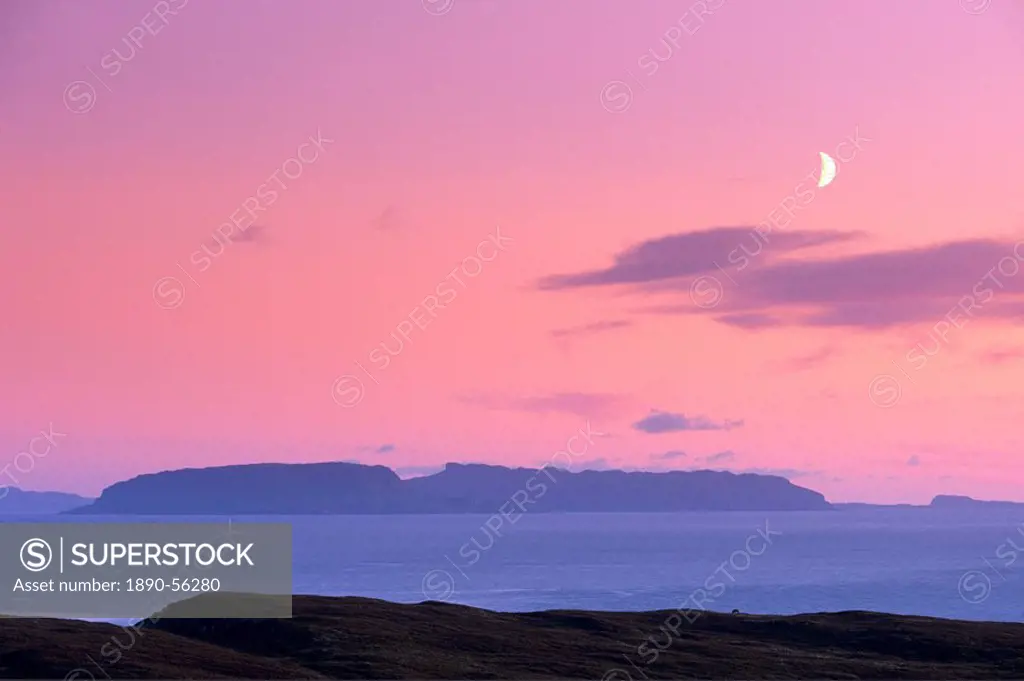 Sunset and half moon over Eigg island, from near Elgol, Isle of Skye, Inner Hebrides, Scotland, United Kingdom, Europe