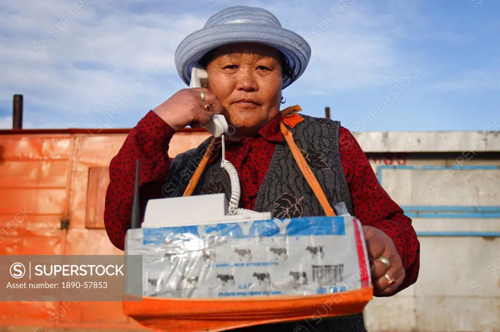 Woman providing telephone calls on the streets of Ulaan Baatar, Mongolia, Central Asia, Asia