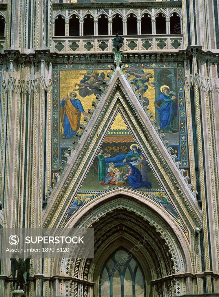 Mosaics, mostly 18th and 19th century replacements of originals, on facade of cathedral, Orvieto, Umbria, Italy, Europe