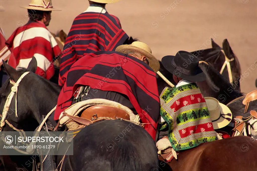 Riders at the Fiesta de Cuasimodo, a traditional festival one week after Easter, Santiago, La Barnechea, Chile, South America