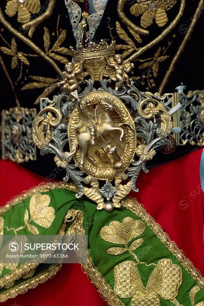 Ornate buckle on traditional Easter costume in the 15th century Albanian town of Piana degli Albanesi, north Sicily, Italy, Europe
