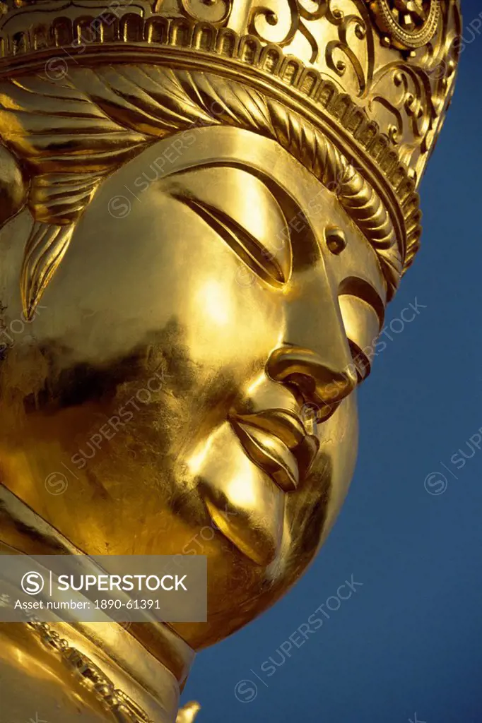 Close_up of the face of the golden Buddha at a new shrine near religious centre of Koyasan on Kii Peninsula, in western Honshu, Japan, Asia
