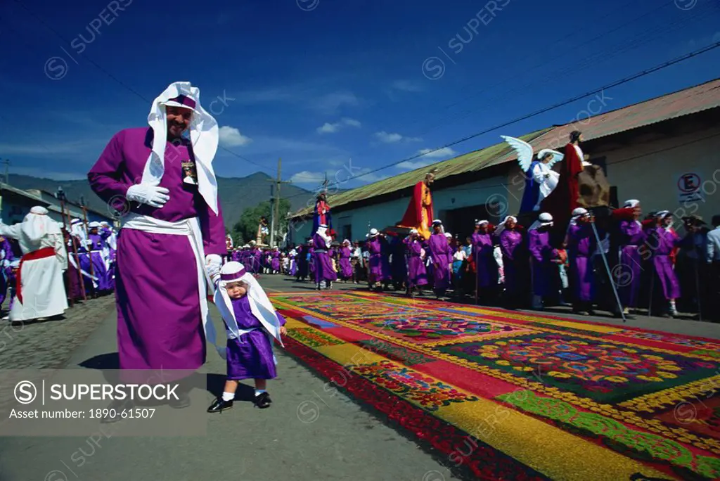 One of the famous Easter processions, with road carpeted with coloured sawdust, Antigua, Guatemala, Central America