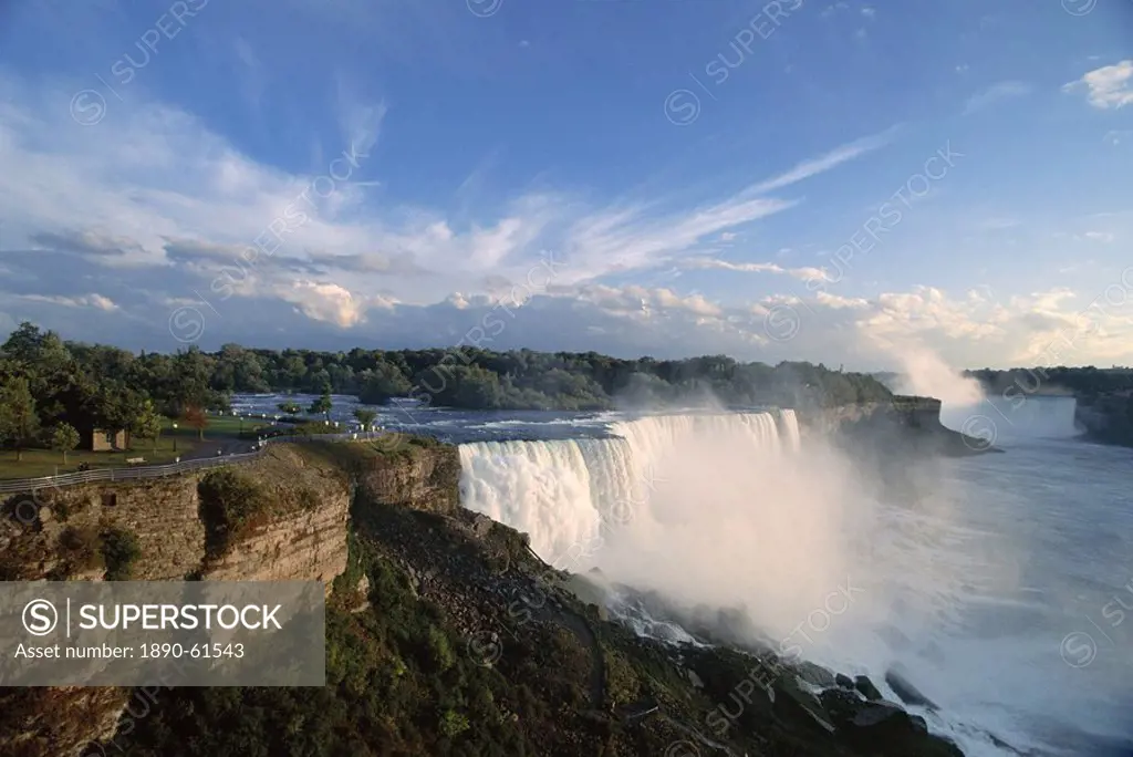 American Falls in foreground, with Horseshoe Falls in the background, Niagara Falls in the gorge that connects Lakes Ontario and Erie, Niagara, New Yo...