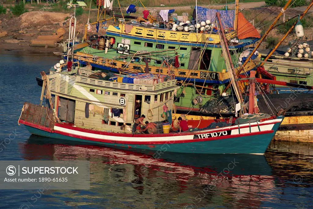 Fishing boats moored on the Terengganu River at Kuala Terengganu, Terengganu, Malaysia, Southeast Asia, Asia