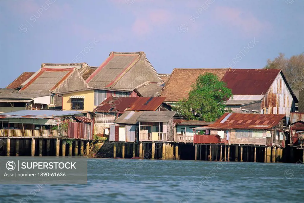 Traditional stilt houses by the Terengganu River in Kuala Terengganu, capital of Terengganu state, Malaysia, Southeast Asia, Asia