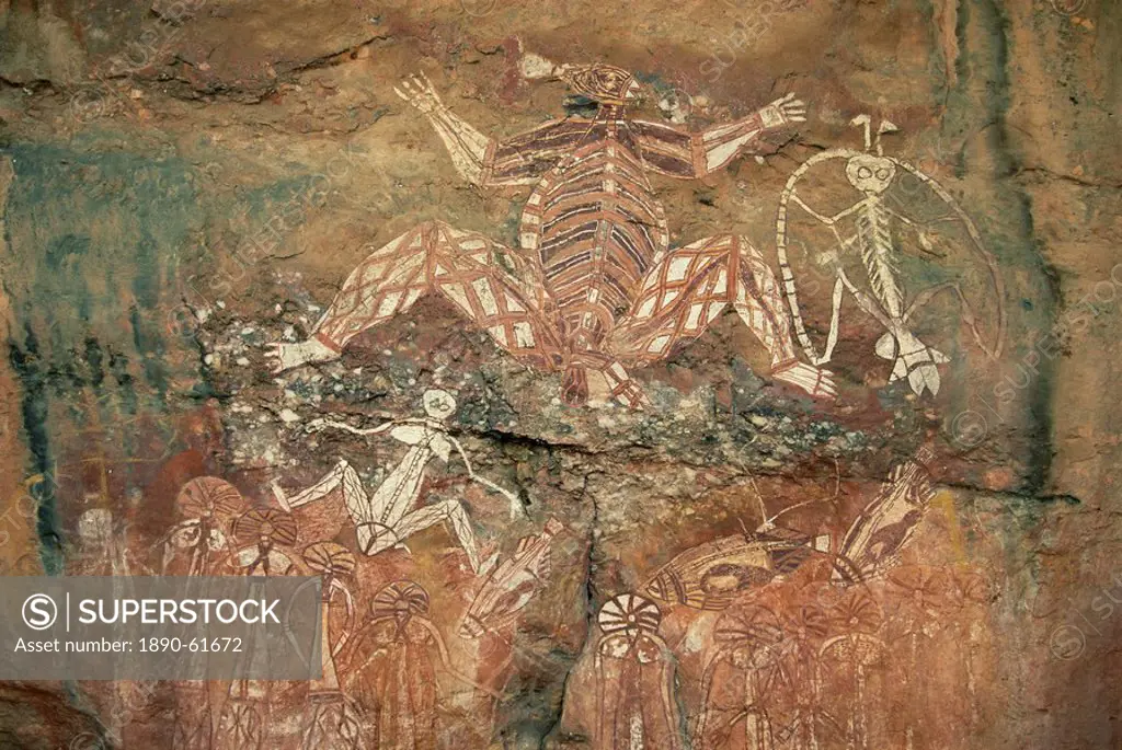 Namondjok in centre, who ate his clan sister, Namarrgon on right the Lightning Man and Barrginj his wife below left, supernatural ancestors at the roc...