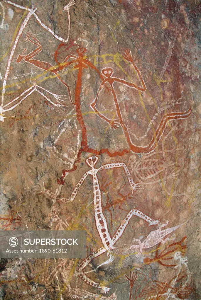 Dancing figures at Nourlangie Rock, aboriginal shelter and rock art site in Kakadu National Park, UNESCO World Heritage Site, Northern Territory, Aust...