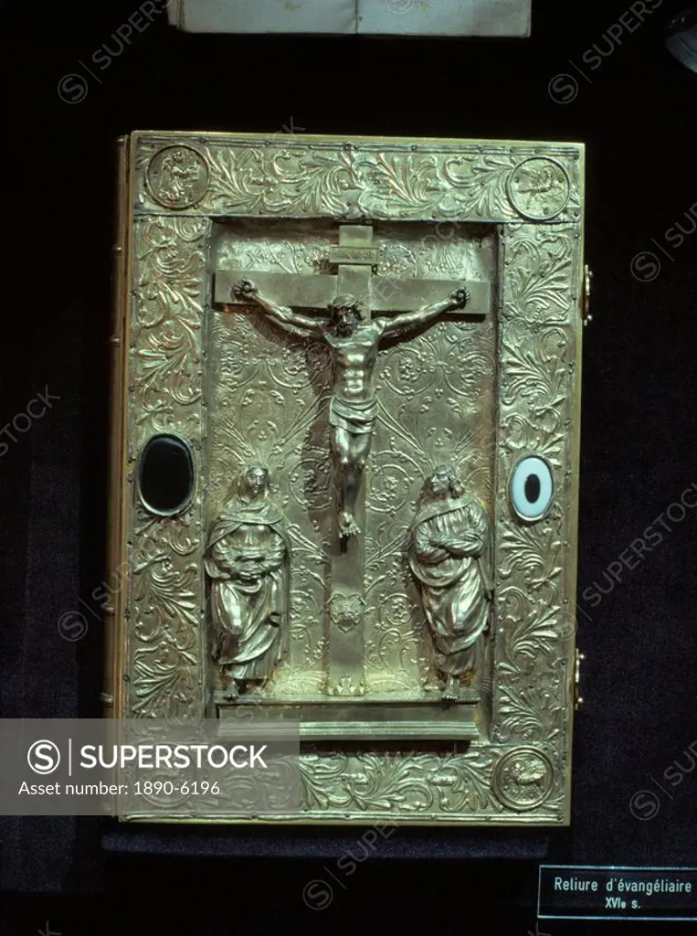 Gold book binding dating from the 16th century showing Christian scene of crucifixion, Treasury of Ste. Foy, Conques, Midi_Pyrenees, France, Europe