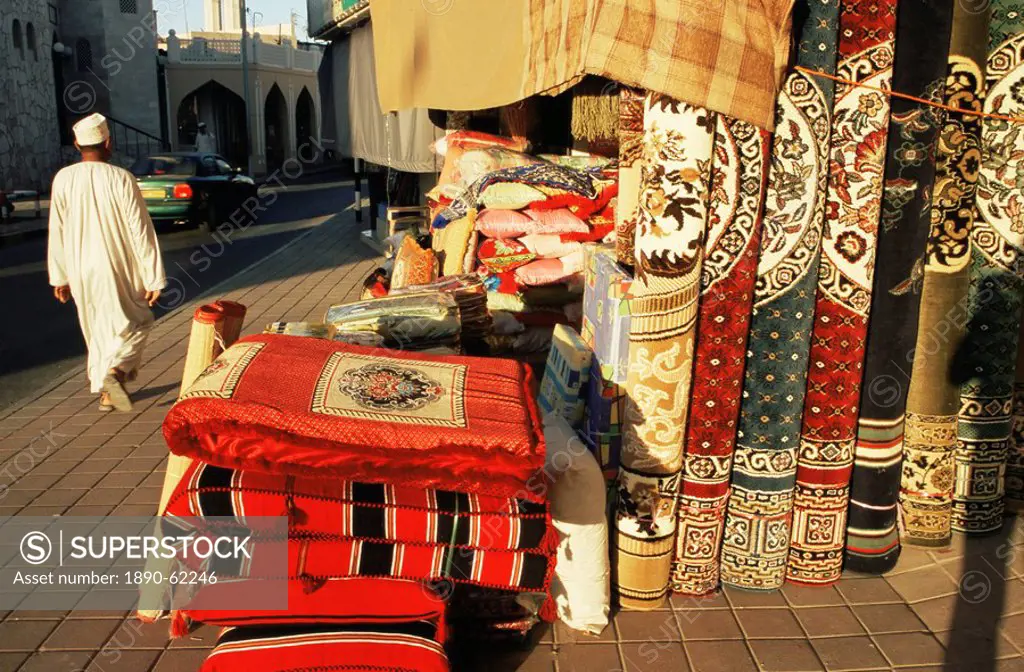 Carpets, cushions and rugs for sale near the Muttrah souk, Muttrah, Muscat, Oman, Middle East