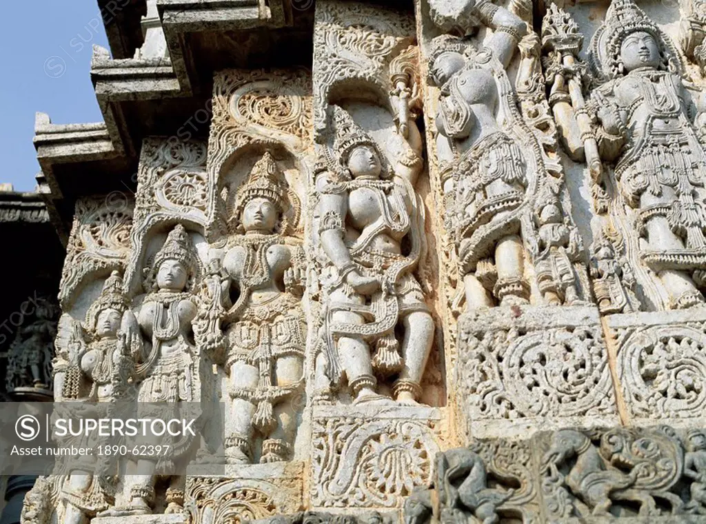 Close_up of carved figures, Hoysaleshvara temple, Halebid, begun in 1121 AD,and uncompleted in 80 years, near Hassan, Karnataka State, India, Asia