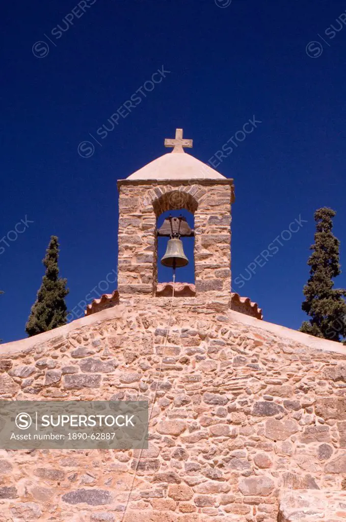 The small stone Byzantine church of Agios Nikolaos on the grounds of the Minos Palace Hotel near the town of Agios Nikolaos Agios Nikolaus, Crete, Gre...