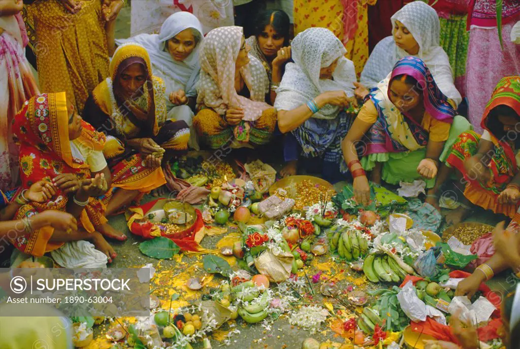 Women at the Lakshmi Puja Festival celebrating Lakshmi, the Hindu Goddess of Wealth and Beauty, India