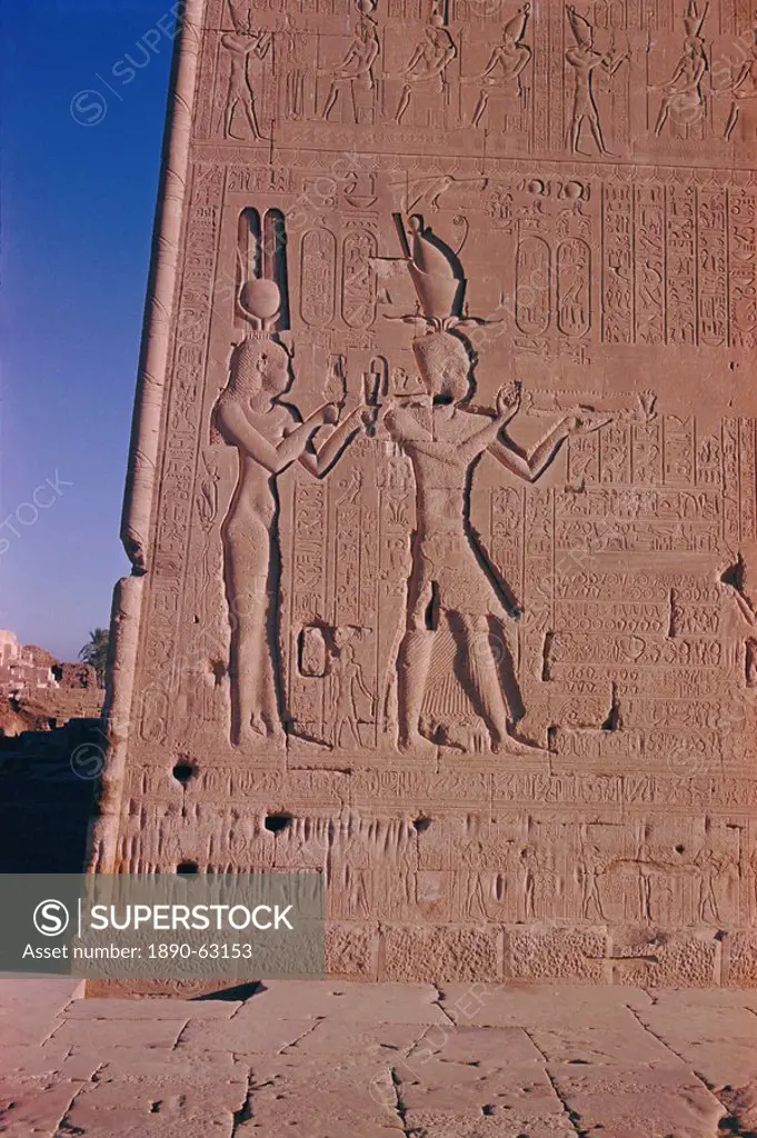 Ptolemy XVI son of Julius Ceasar, with his mother Cleopatra, in presence of deities, reliefs on the south facade, late Plotemaic temple of Hathor, Den...