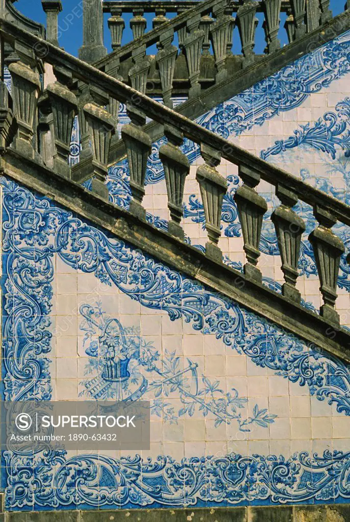 Detail of external staircase decorated with azulejos tiles, paco or manor house of Counts of Estoi, Estoi, Algarve, Portugal, Europe