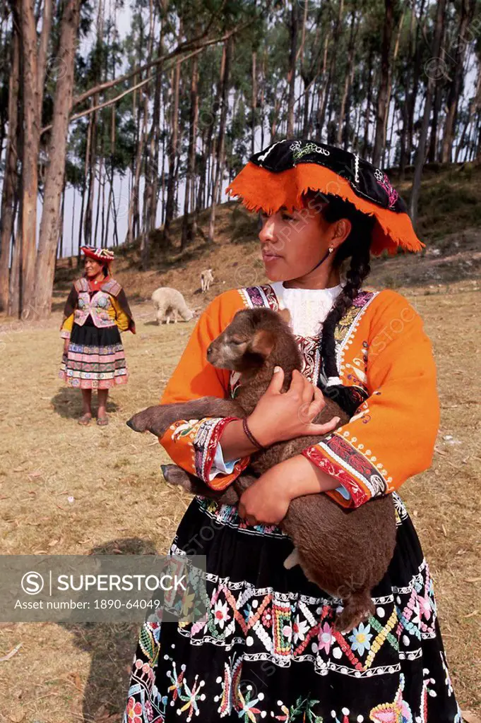 Portrait of a local Peruvian young woman in traditional dress, Cuzco Cusco, Peru, South America