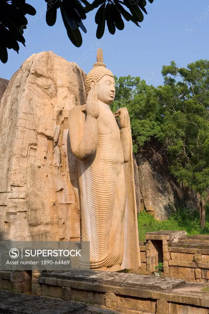 Giant statue dating from the 5th century, of the standing Buddha giving a blessing with his right hand, and lifting the robe to signify reincarnation ...
