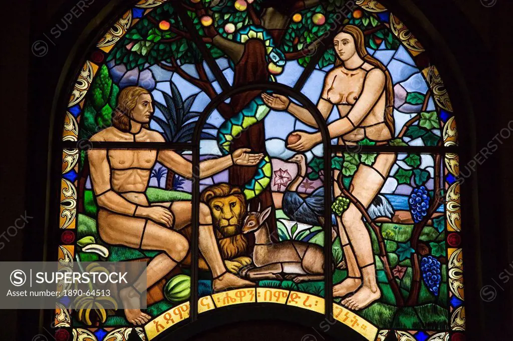 Stained glass window depicting Adam and Eve in the Garden of Eden, Holy Trinity Cathedral, the largest Orthodox church in the country, built between 1...