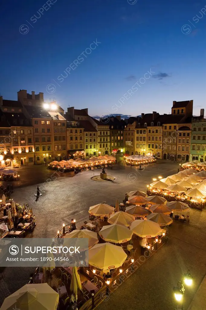 Elevated view over the square and outdoor restaurants and cafes at dusk Old Town Square Rynek Stare Miasto, UNESCO World Heritage Site, Warsaw, Poland...