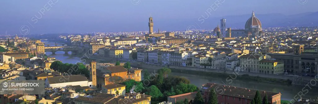 Panoramic view over rooftops and across Arno River of city including the Duomo Cathedral, Uffizi and Ponte Vecchio, from Piazalle Michelangelo, Floren...