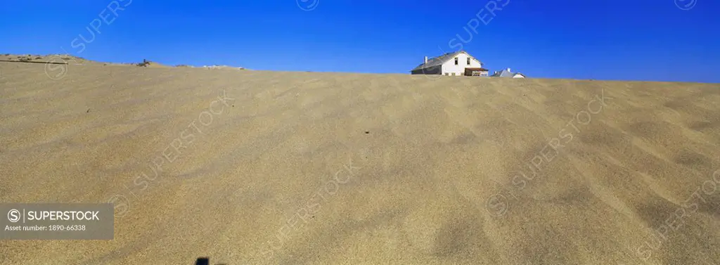 Exterior of German house in the deserted mining town of Kolmanskop in the Restricted Diamond area on the south west coast, near the town of Luderitz, ...