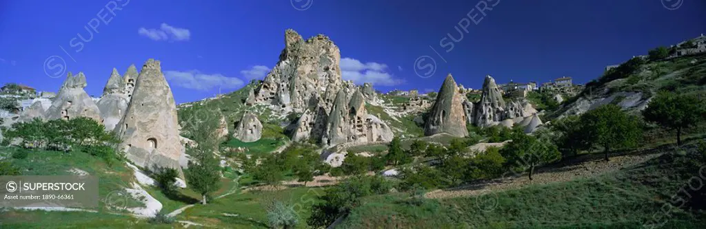 Panoramic view of ancient cave dwellings in the volcanic tufa formations, Uchisar, Cappadocia, Anatolia, Turkey, Asia Minor, Asia