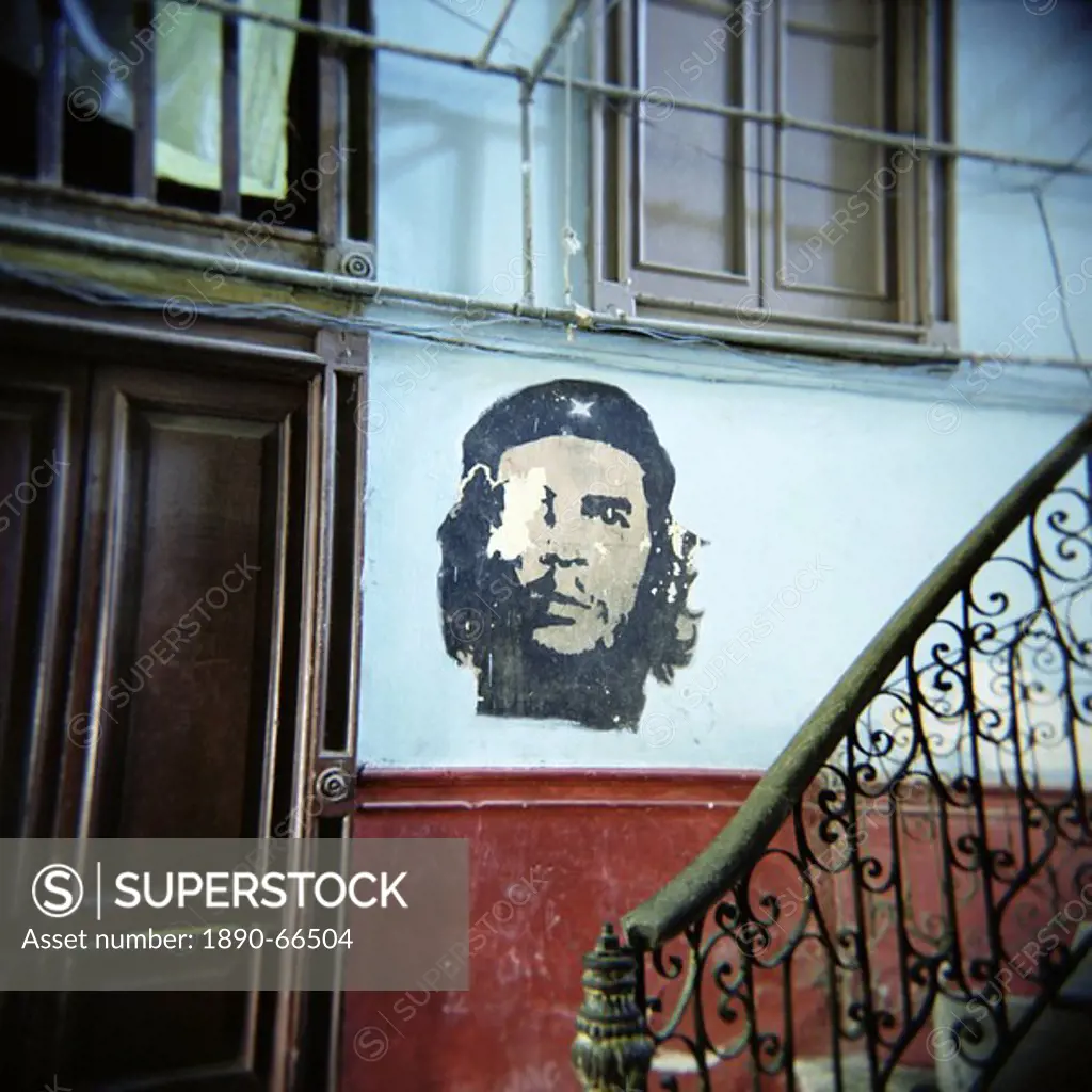 Image of Che Guevara on wall outside apartment, Havana, Cuba, West Indies, Central America