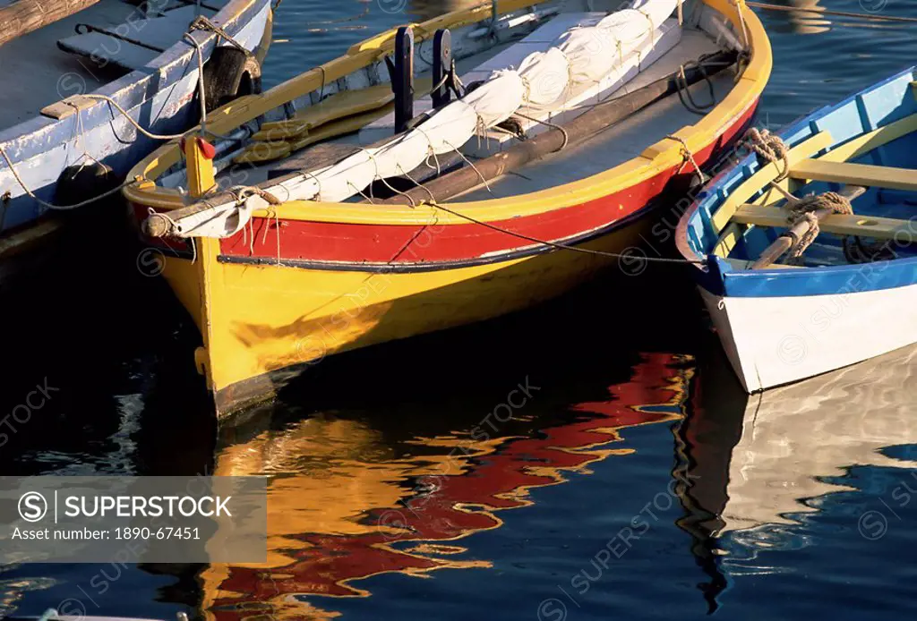 Colourful boats reflected in the water of the harbour, Sete, Herault, Languedoc_Roussillon, France, Europe