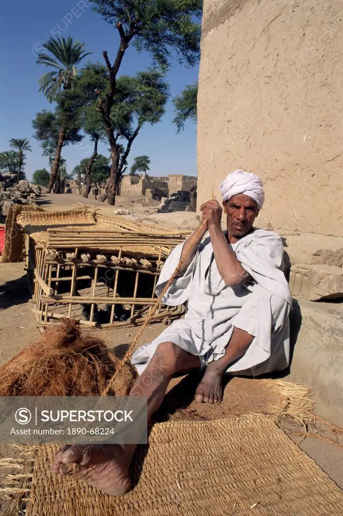 Villager making tether rope, Tod, near Luxor, Egypt, North Africa, Africa