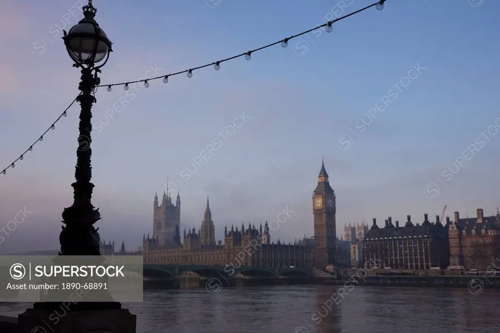 Early misty morning view of Big Ben and the Houses of Parliament across Westminster Bridge, London, England, United Kingdom, Europe