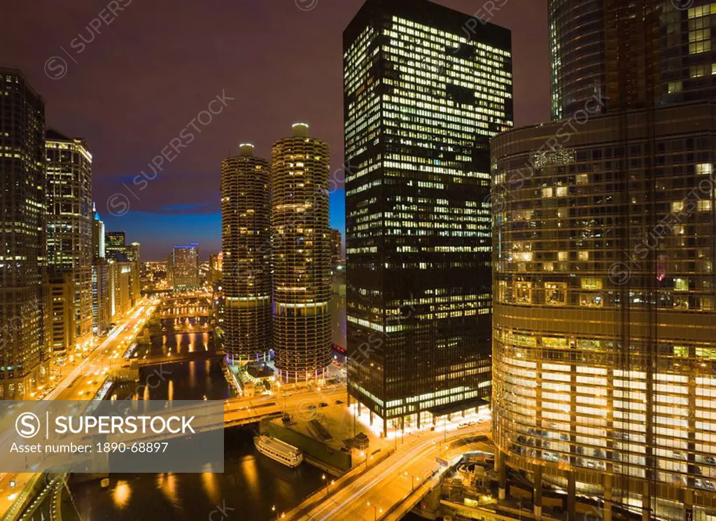 Buildings along Wacker Drive and the Chicago River at dusk, Marina City centre, Trump Tower on right, Chicago, Illinois, United States of America, Nor...