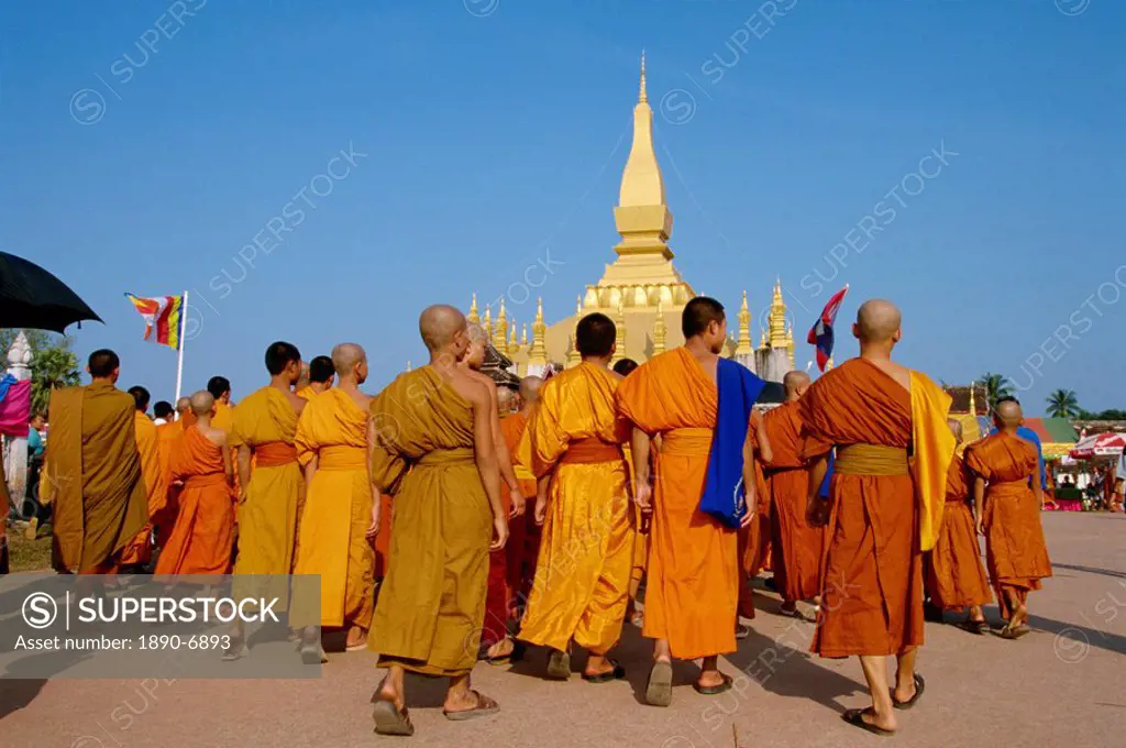 A group of monks at the annual Makka Bu Saa Buddhist celebration, during Pha That Luang Buddhist Lent, in Vientiane, Laos, Indochina, Southeast Asia, ...