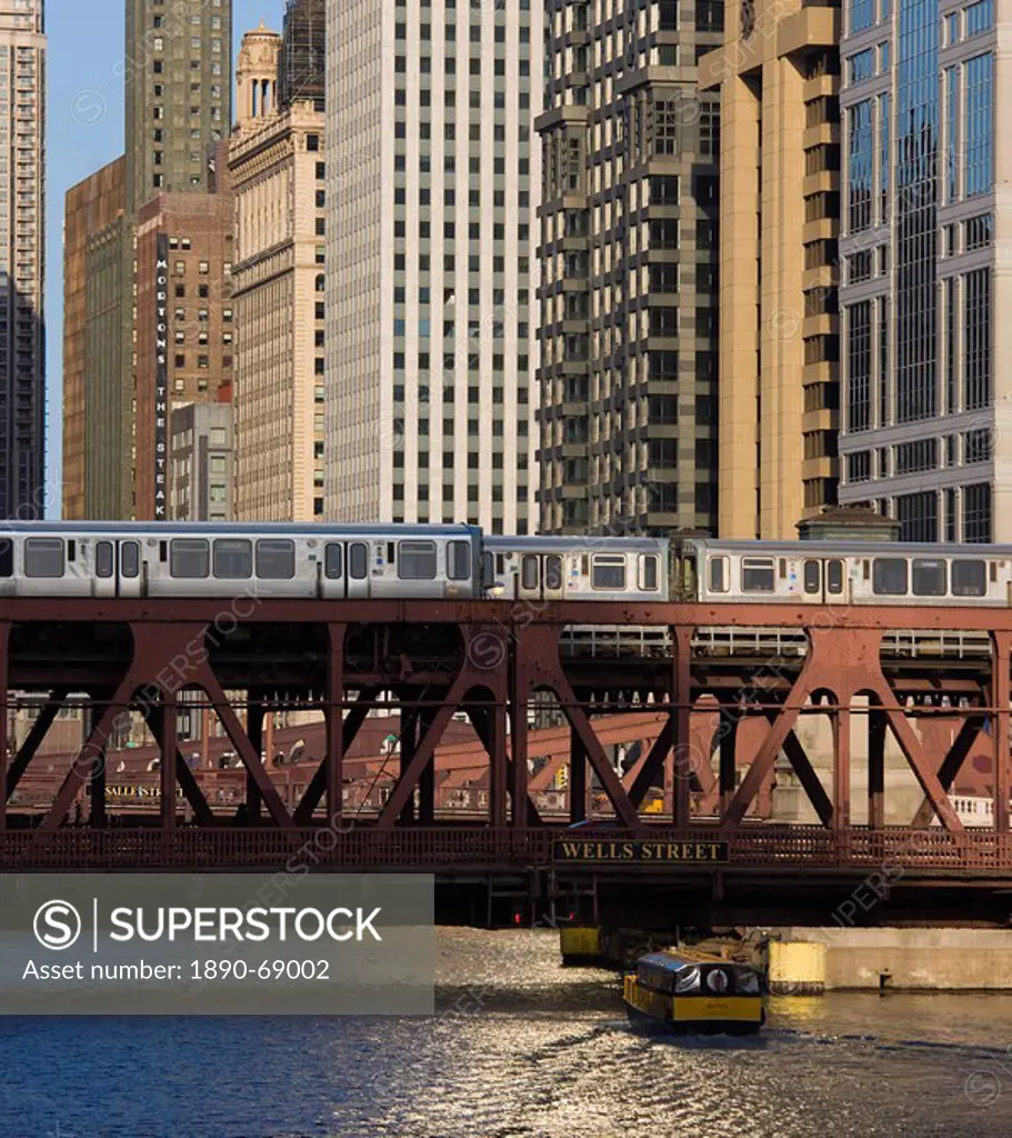 An El train on the Elevated train system crossing Wells Street Bridge, Chicago, Illinois, United States of America, North America