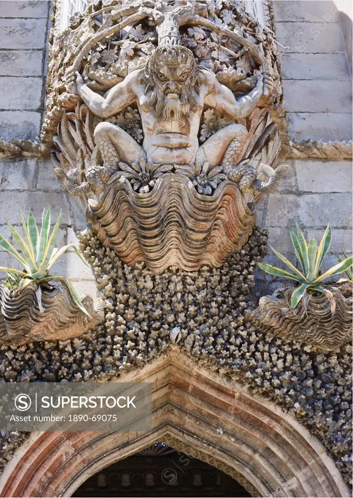 Fierce gargoyle above archway, Pena National Palace, UNESCO World Heritage Site, Sintra, Portugal, Europe