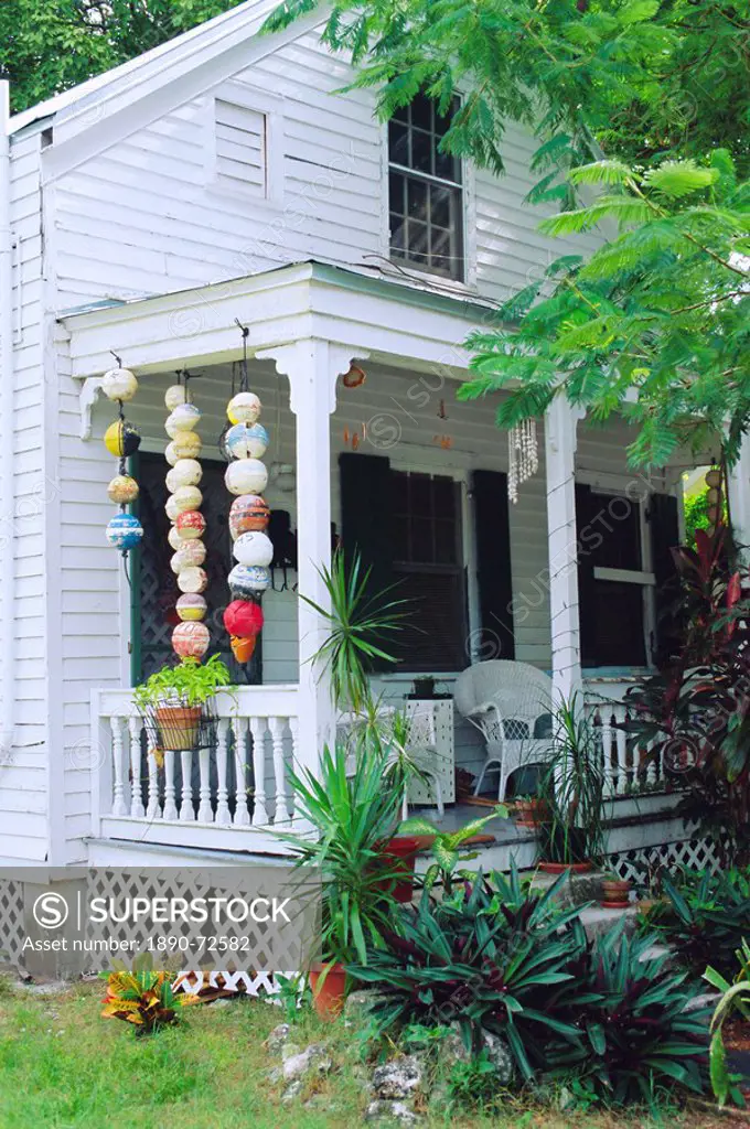 Fishing floats hanging in porch of old house in Key West, Florida, USA