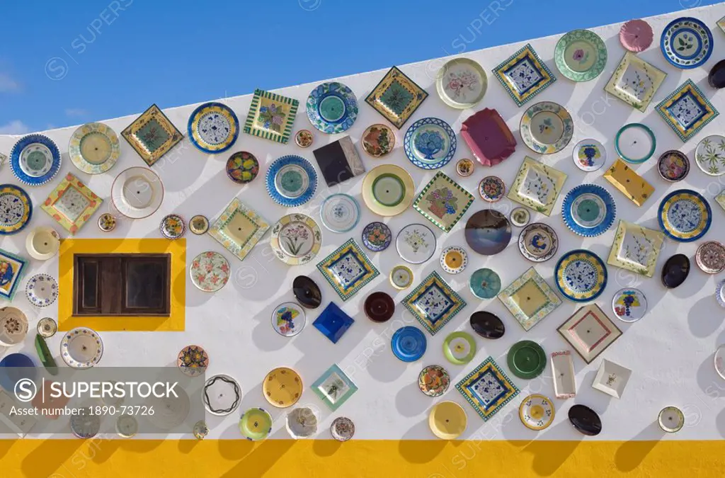 Traditional Portuguese pottery, artisan workshop with plates on wall, Cape St. Vincent peninsula, Sagres, Algarve, Portugal, Europe