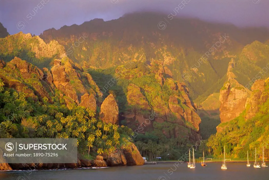 Coastal scenery and boats, Bay of Virgins, Hanavave, Fatu Iva island, Marquesas Islands archipelago, French Polynesia, South Pacific Islands, Pacific